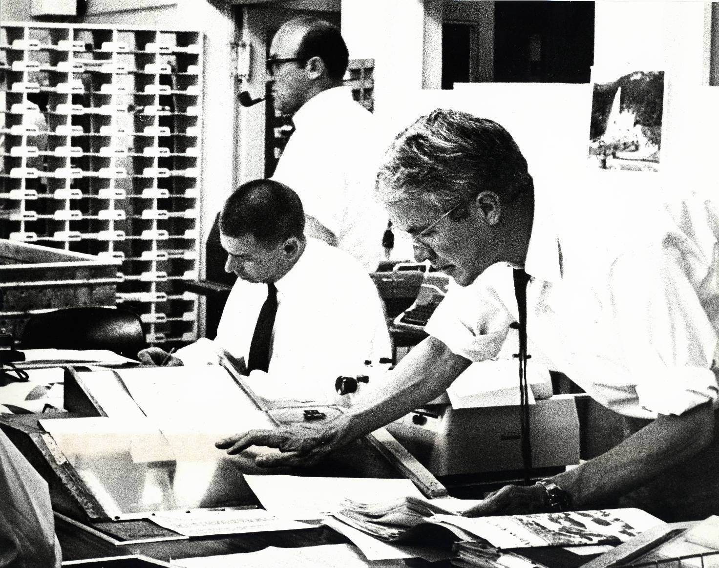 RFE COVERS THE MIDDLE EASET CRISIS -- At work in RFE's Central News Room during the Arab-Israeli war: (from left) Editor Arthur Breslauer, Assistant NEws Director Tom Bodin and Deputy CNR Chief Brian McGill. June 1967.